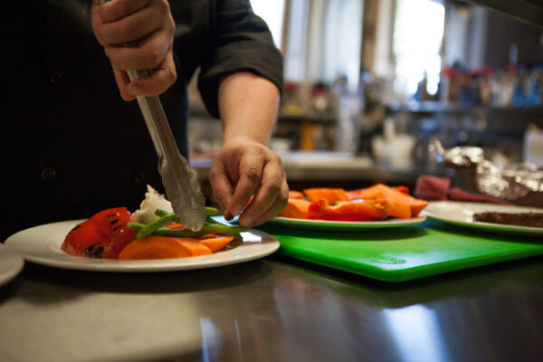 Frederick's Dinner chef plating meal